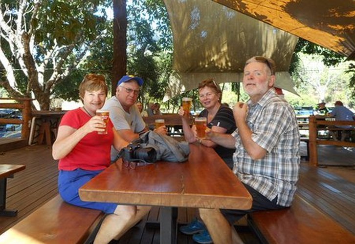 Tour participants having a beer